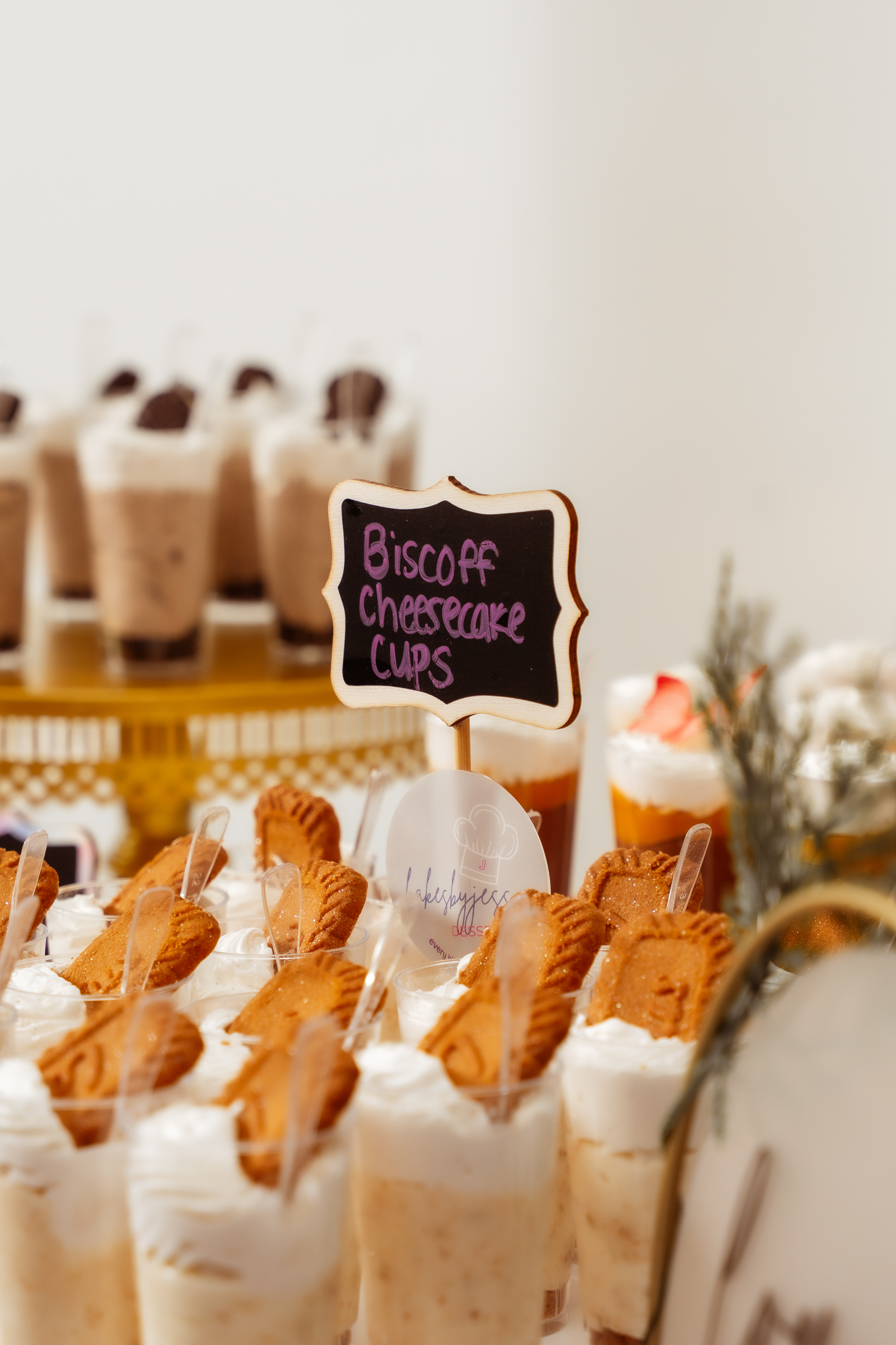 Biscoff cheesecake dessert cups on a dessert bar